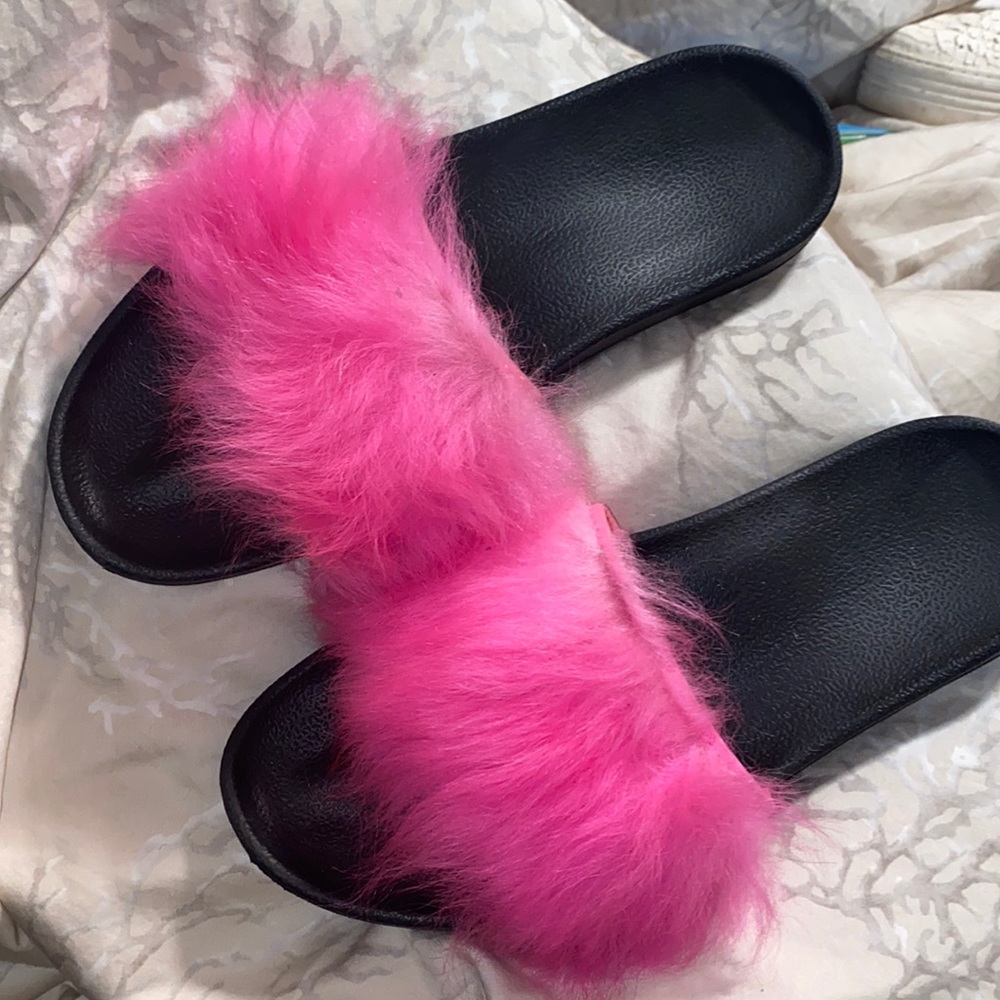 Pink fur Ugg slides
